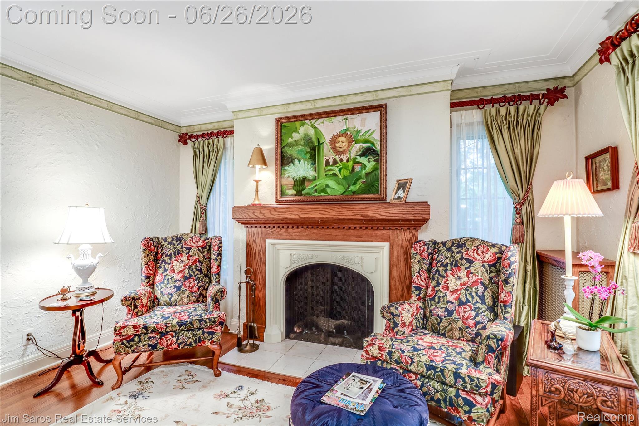 764 Harcourt Road Grosse Pointe, MI 48230 - Photo 5 of 42 Focal fireplace with an ornate wood mantel and a tile hearth