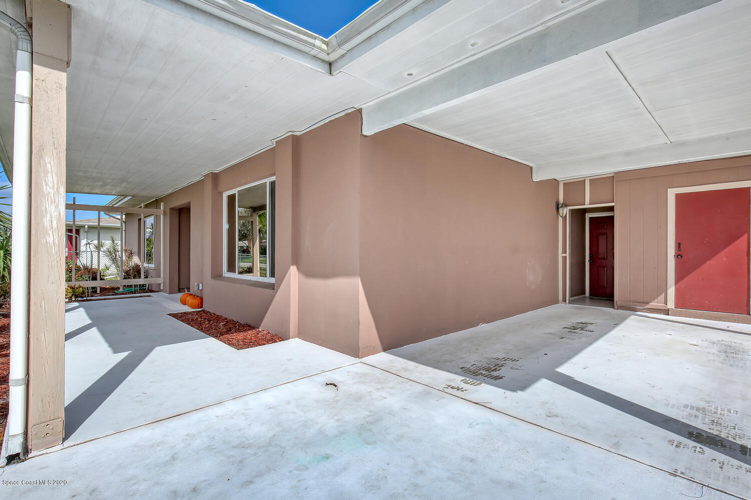 765 Angle Street Northeast Palm Bay, FL 32905 - Photo 2 of 42 Front Porch and Car Port