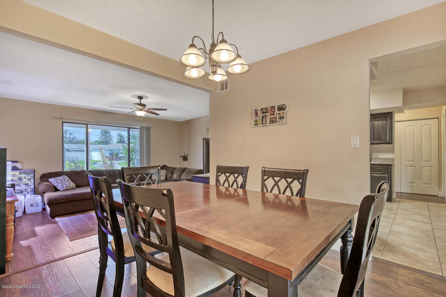 765 Angle Street Northeast Palm Bay, FL 32905 - Photo 14 of 42 Formal Dining to Living and Kitchen