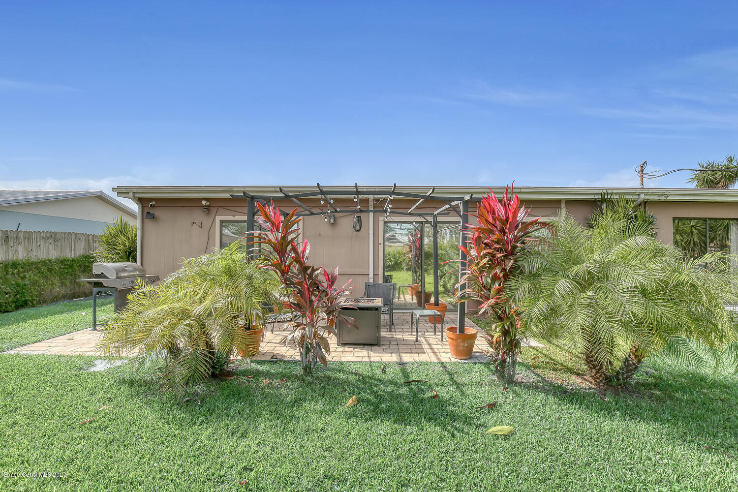 765 Angle Street Northeast Palm Bay, FL 32905 - Photo 29 of 42 Backyard with Patio