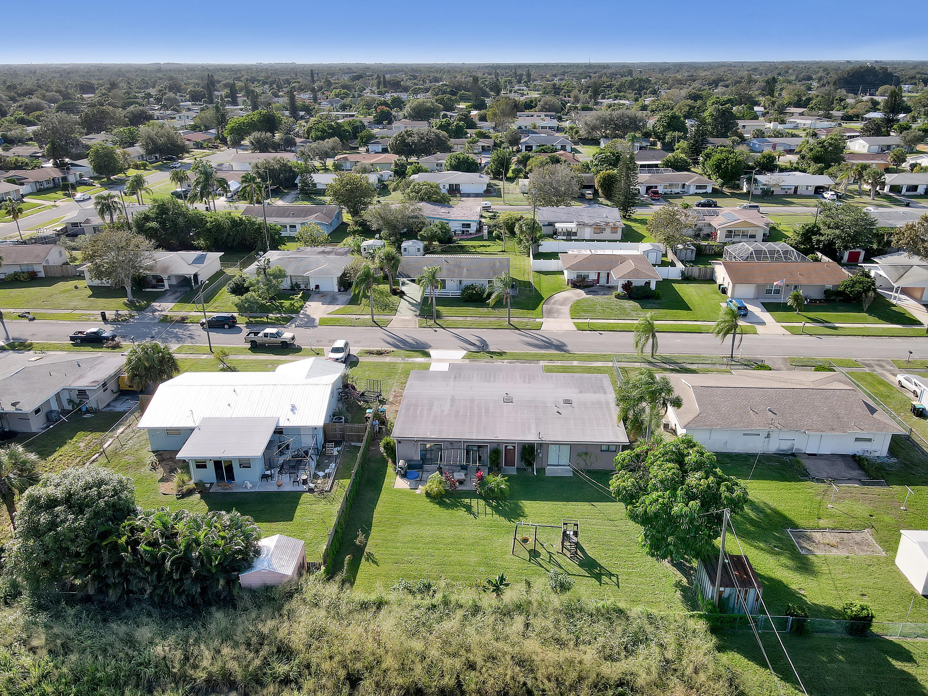765 Angle Street Northeast Palm Bay, FL 32905 - Photo 42 of 42 Drone Low Angle