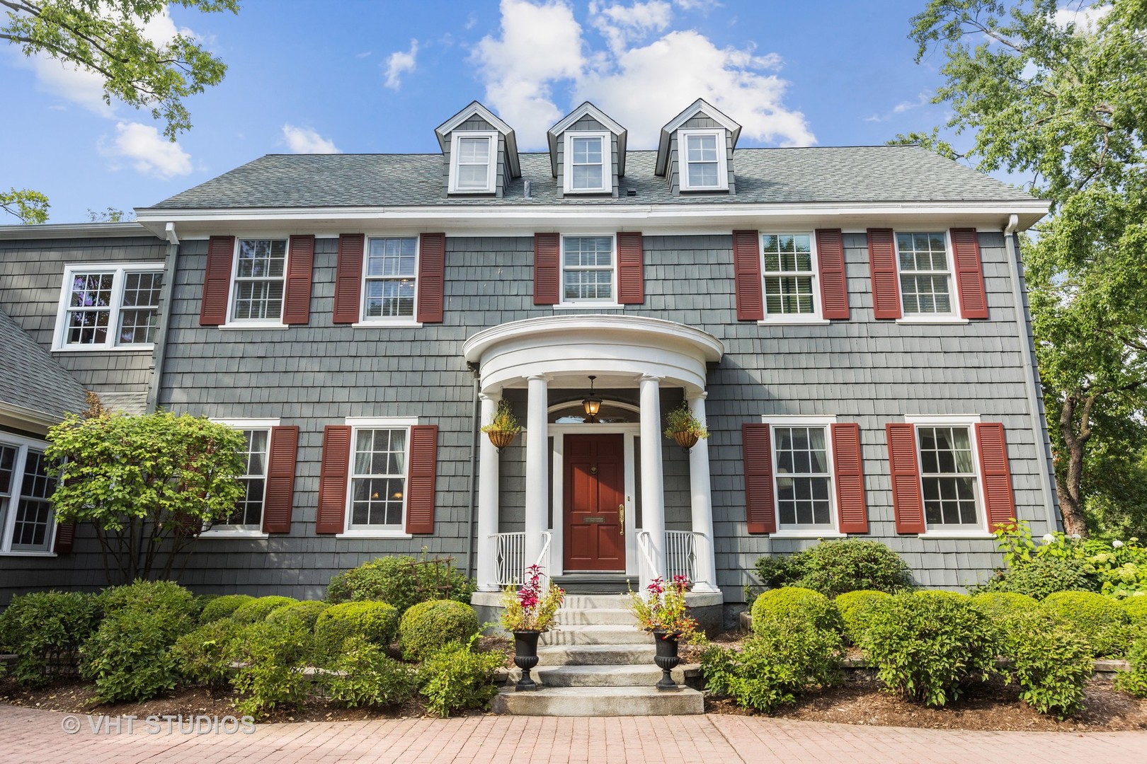 front view of a house with a yard
