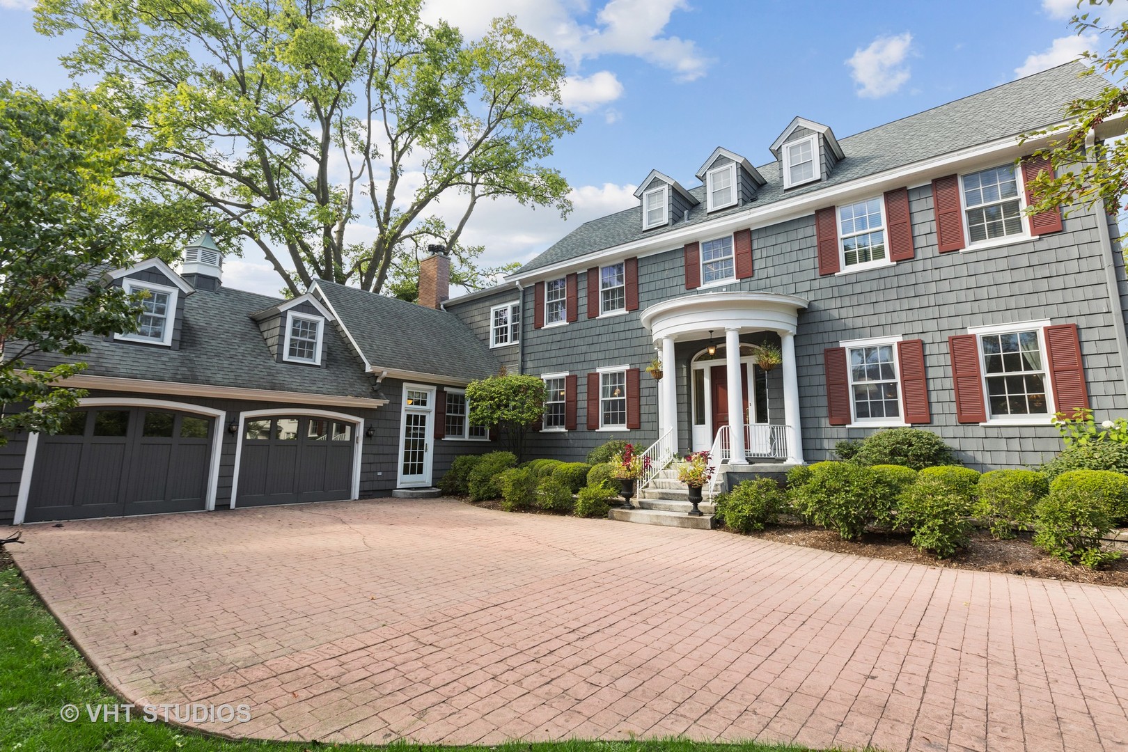 142 Akenside Road Riverside, IL 60546 - Photo 2 of 42 a front view of a house with a yard