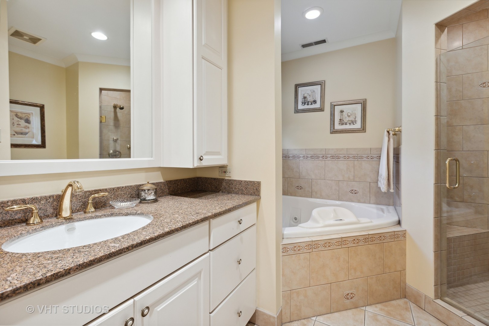 142 Akenside Road Riverside, IL 60546 - Photo 23 of 42 a bathroom with a granite countertop tub sink and mirror