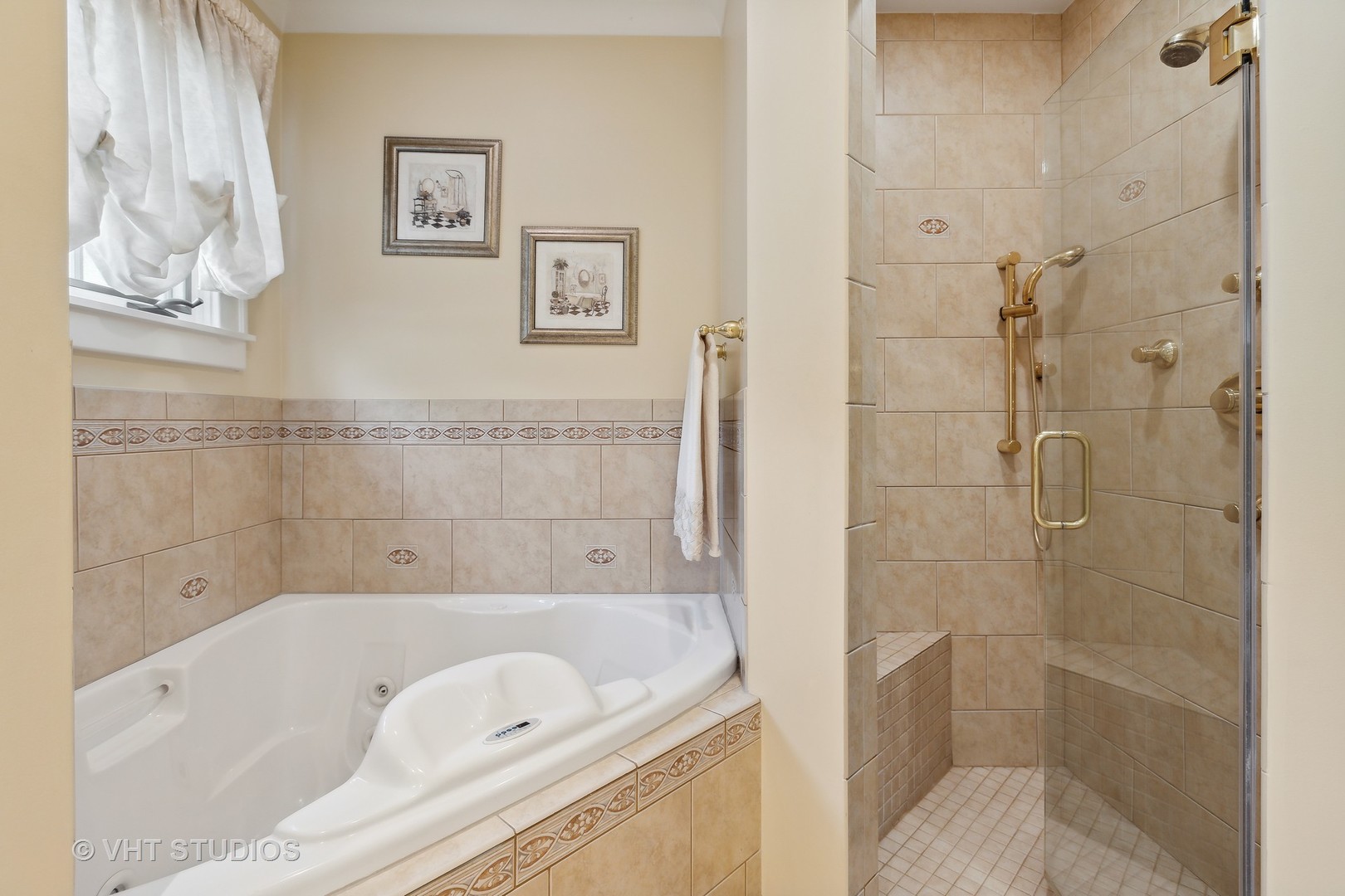 142 Akenside Road Riverside, IL 60546 - Photo 24 of 42 a bathroom with a bathtub and shower