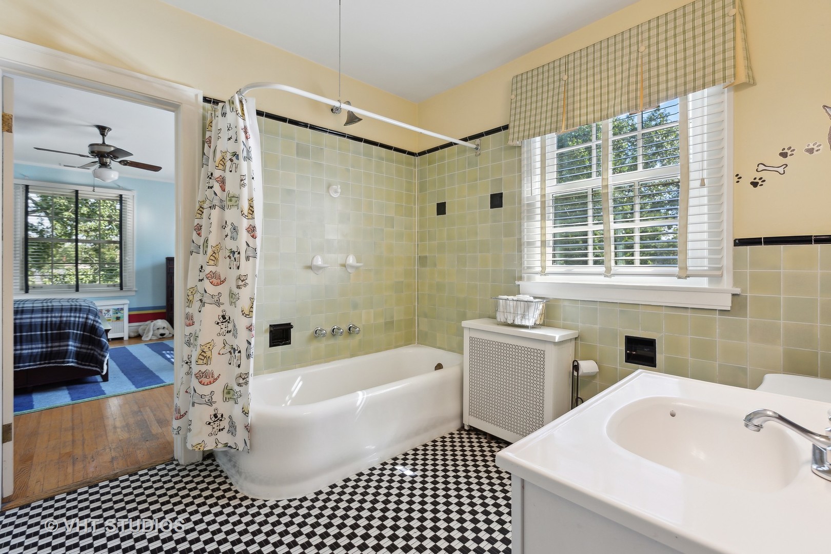 142 Akenside Road Riverside, IL 60546 - Photo 28 of 42 a bathroom with a bathtub a sink a window and a shower