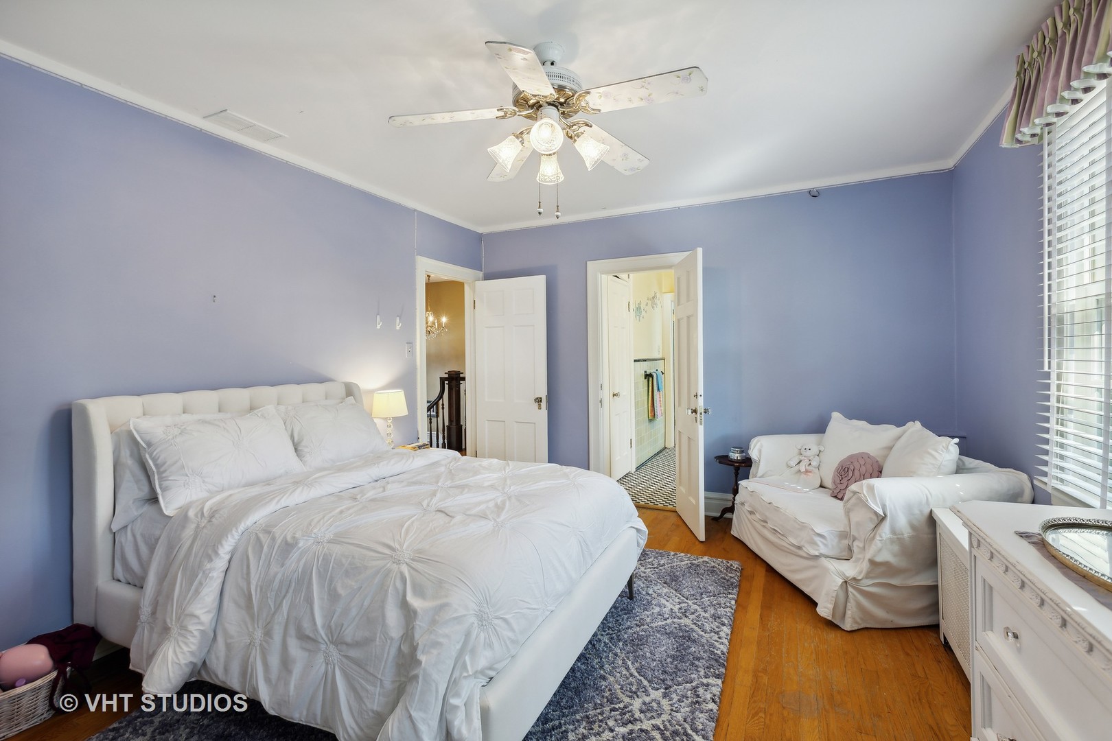 142 Akenside Road Riverside, IL 60546 - Photo 30 of 42 a bedroom with a bed and ceiling fan