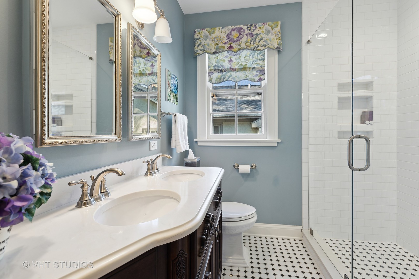 142 Akenside Road Riverside, IL 60546 - Photo 32 of 42 a bathroom with a sink a toilet and shower