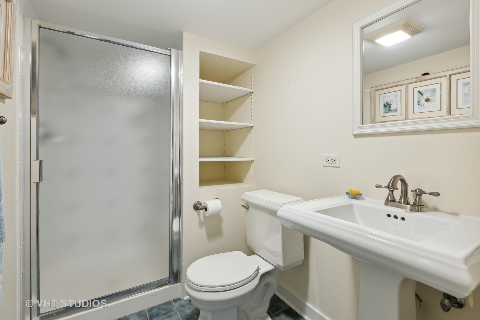 142 Akenside Road Riverside, IL 60546 - Photo 35 of 42 a bathroom with a sink a toilet and shower