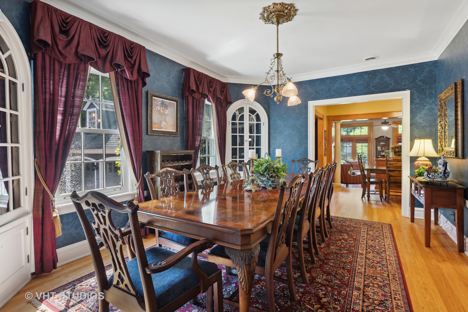 142 Akenside Road Riverside, IL 60546 - Photo 10 of 42 a view of a dining room with furniture window and wooden floor