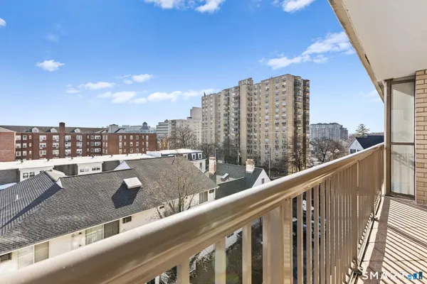 a view of a city from a balcony