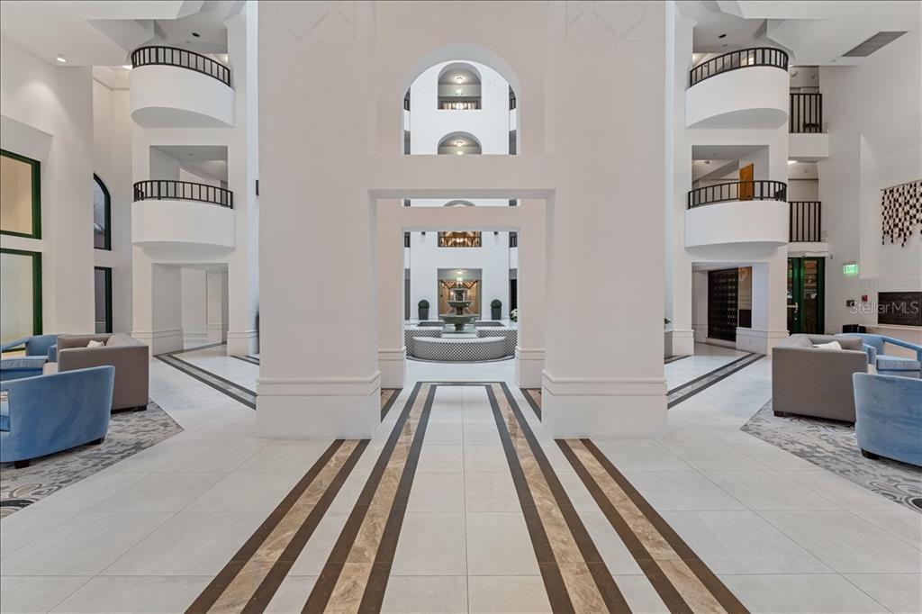 100 Southeast 5th Avenue, Unit 412 Boca Raton, FL 33432 - Photo 42 of 62 a view of a living room and kitchen with furniture