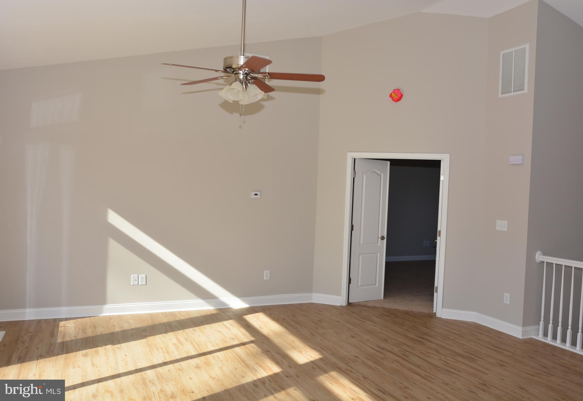 11231 Rawhide Road Lusby, MD 20657 - Photo 12 of 18 View from Kitchen facing Master Bedroom entrance