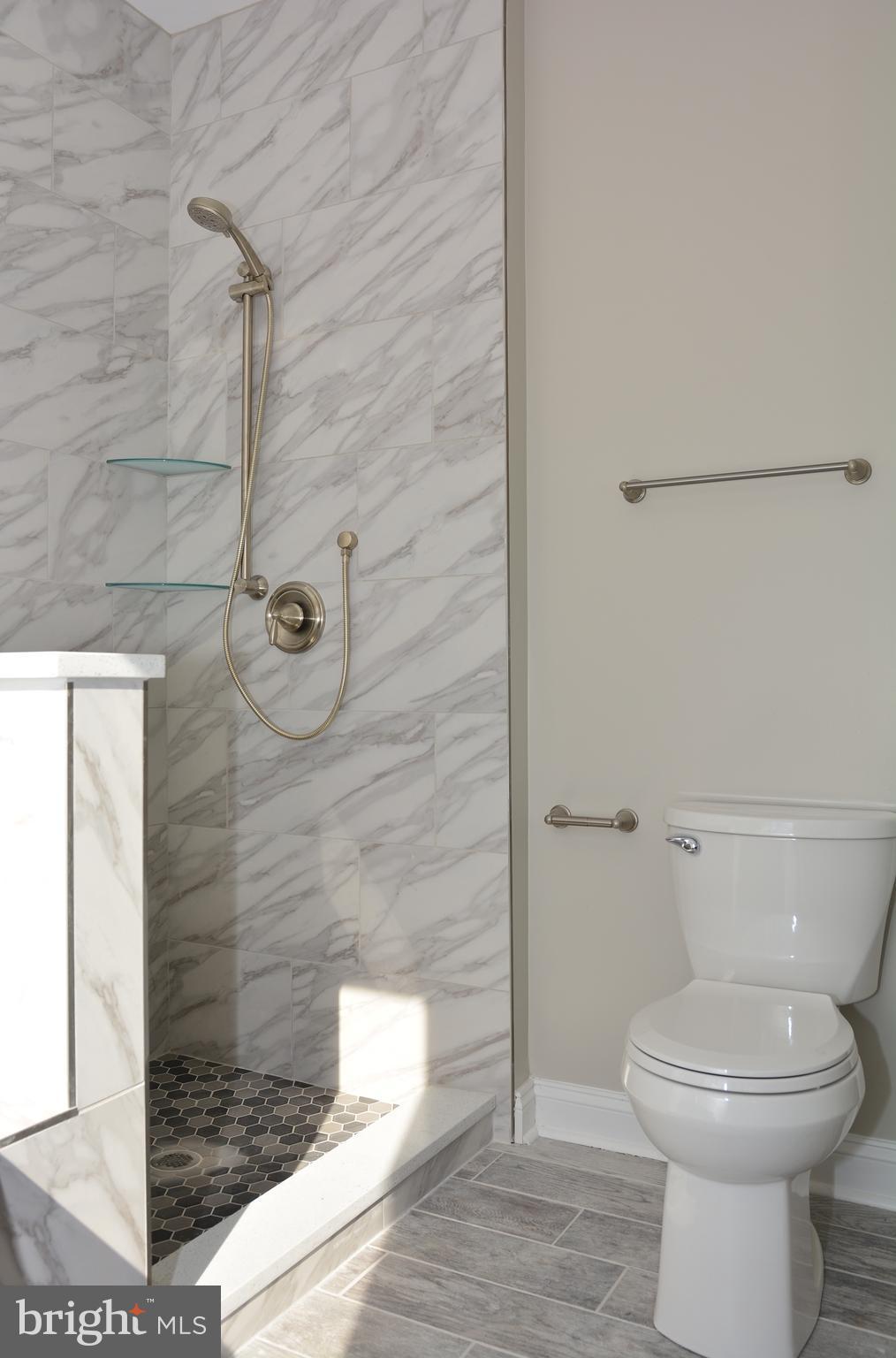 11231 Rawhide Road Lusby, MD 20657 - Photo 14 of 18 Brand new tile shower with all the extras!