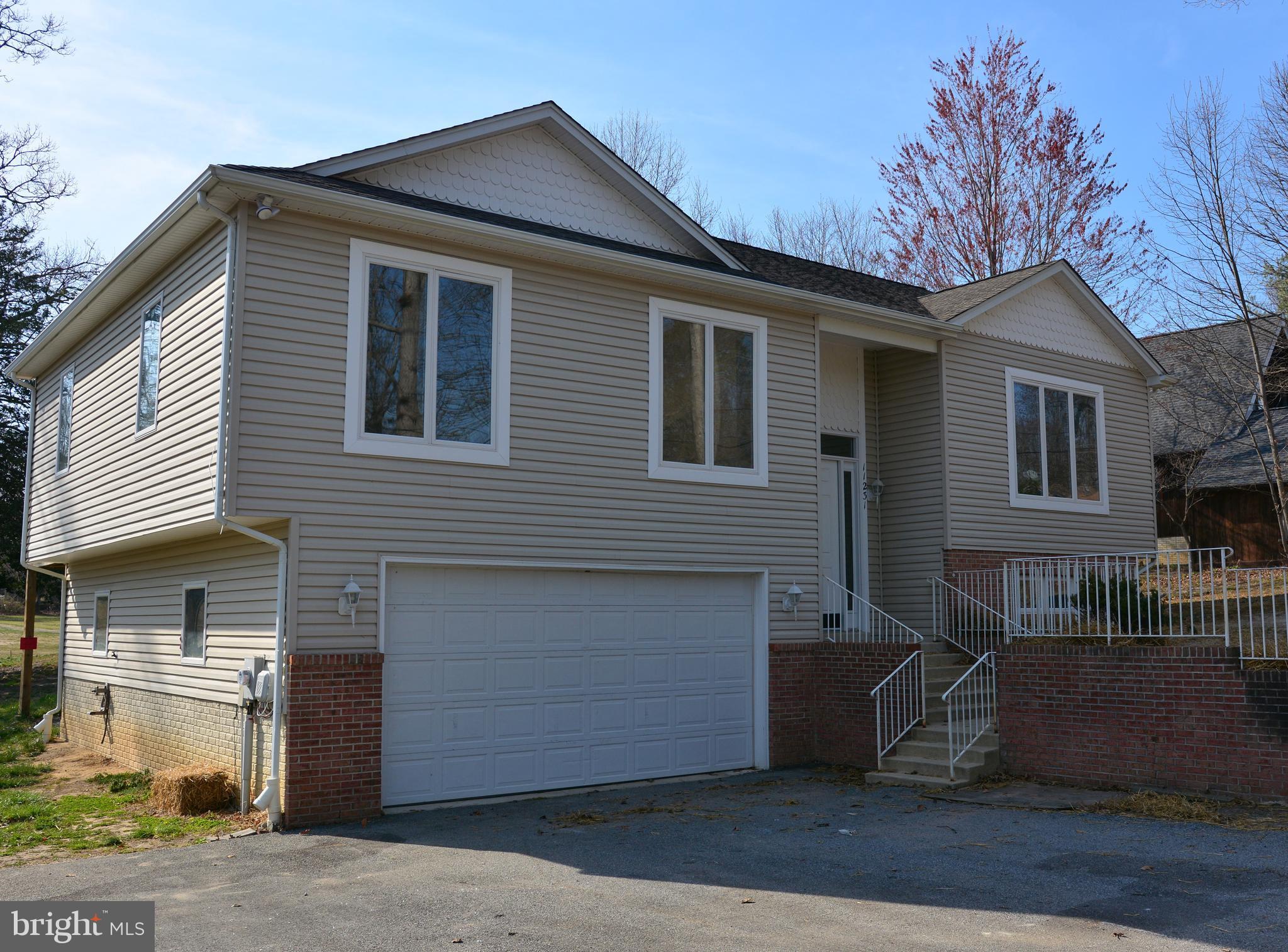 11231 Rawhide Road Lusby, MD 20657 - Photo 18 of 18 Vinyl Siding, Large windows, great curb appeal!