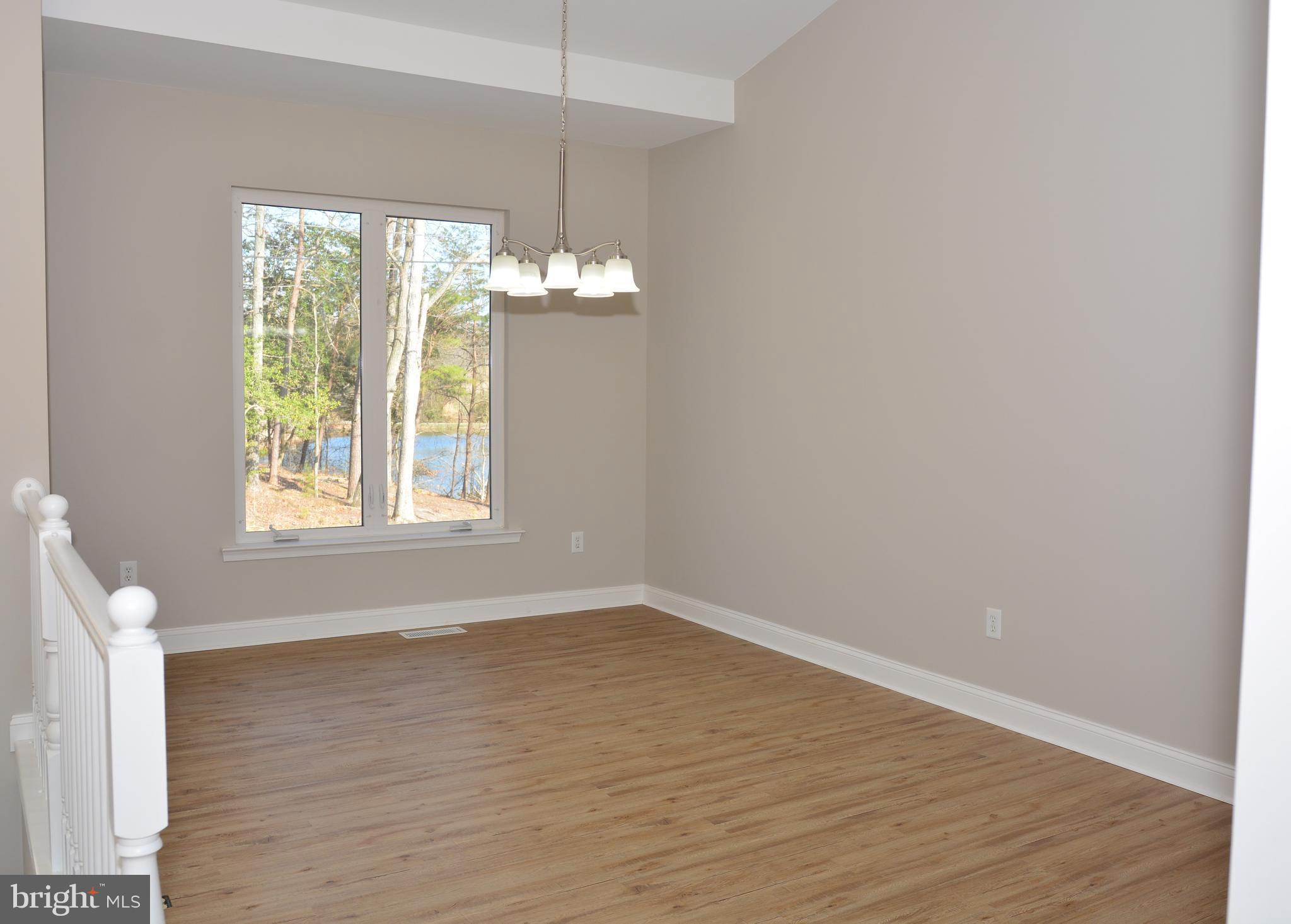 11231 Rawhide Road Lusby, MD 20657 - Photo 5 of 18 Dining Room view two as you come up the stairs