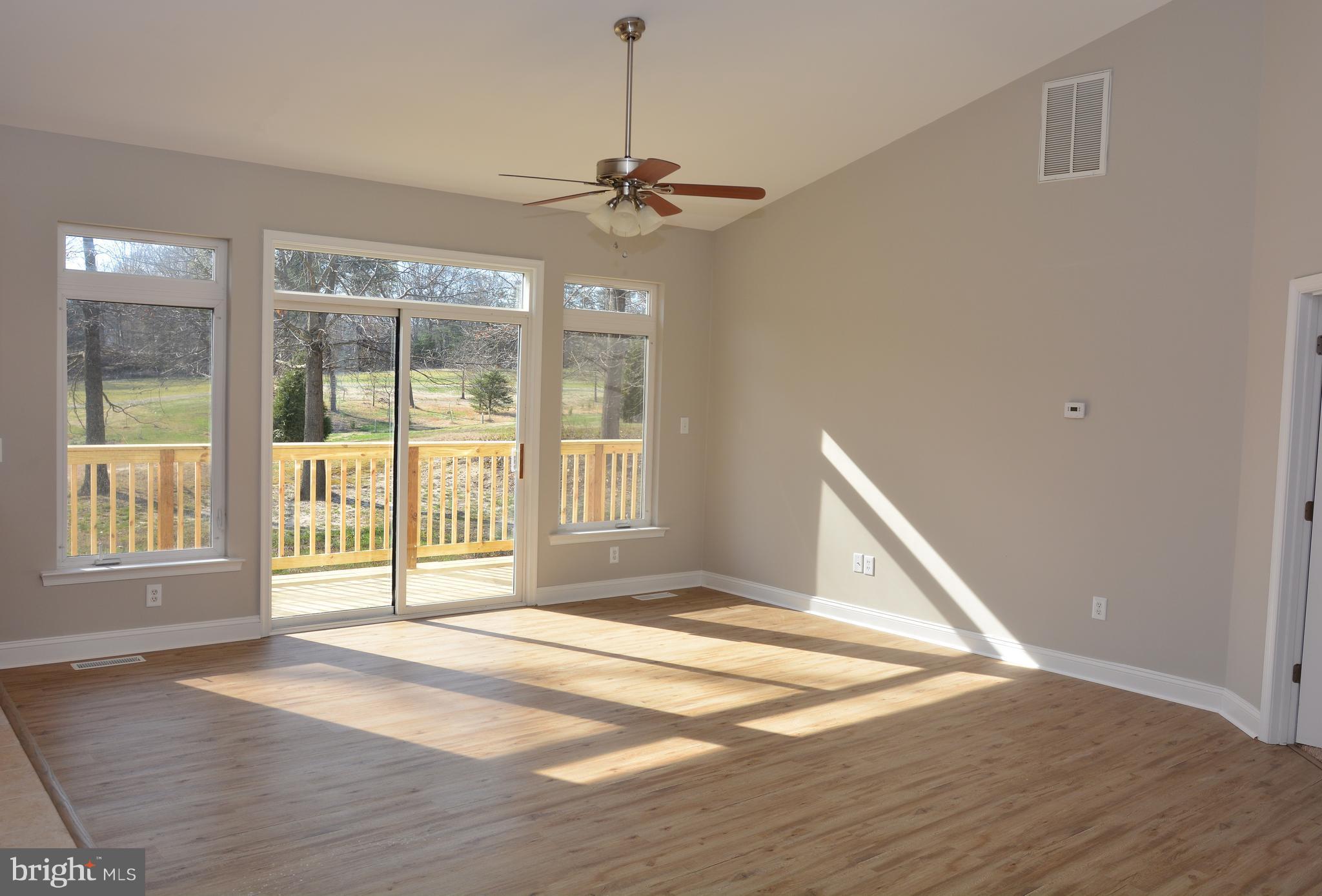 11231 Rawhide Road Lusby, MD 20657 - Photo 8 of 18 Gorgeous Vaulted ceilings, LVT flooring