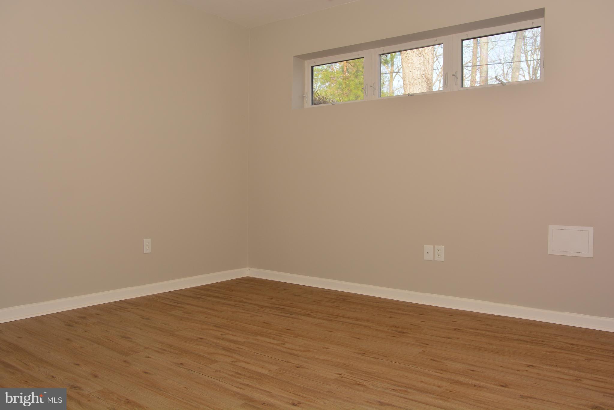 11231 Rawhide Road Lusby, MD 20657 - Photo 9 of 18 Basement Bonus Room!! Additionally living space