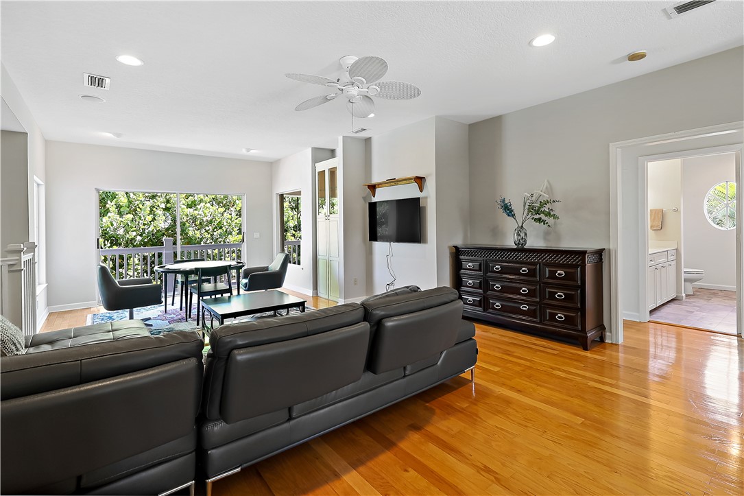 2038 Ocean Ridge Circle Vero Beach, FL 32963 - Photo 27 of 33 a living room with furniture and a large window