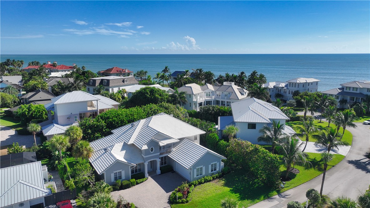 2038 Ocean Ridge Circle Vero Beach, FL 32963 - Photo 8 of 33 an aerial view of a house with a garden