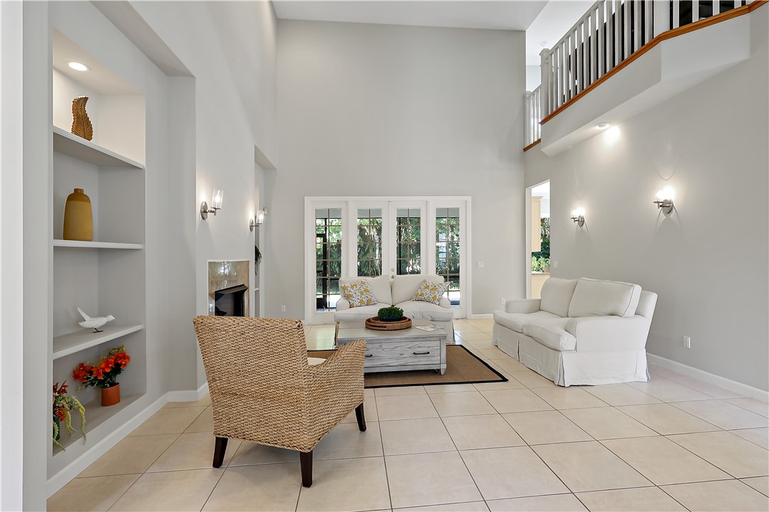 2038 Ocean Ridge Circle Vero Beach, FL 32963 - Photo 9 of 33 a living room with furniture and a window