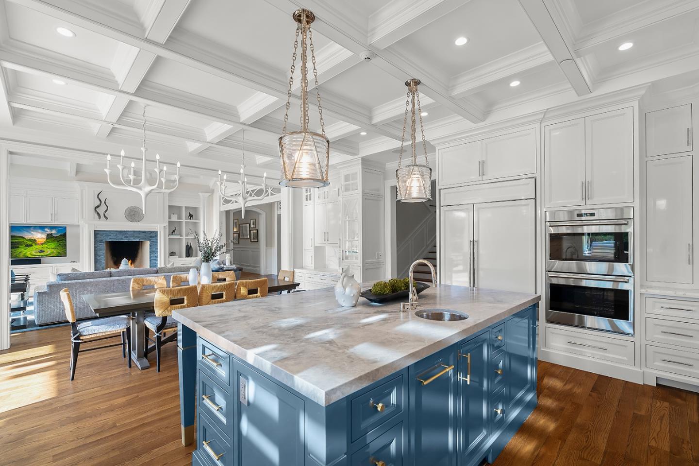 14966 Sobey Road Saratoga, CA 95070 - Photo 16 of 70 a kitchen with stainless steel appliances a stove center island cabinets and wooden floor