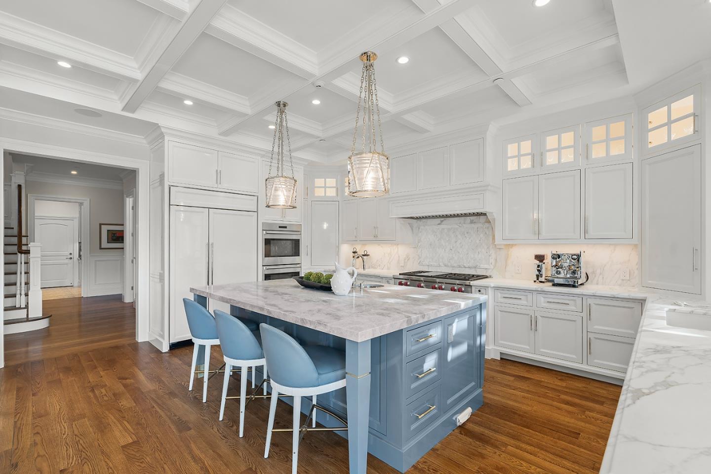 14966 Sobey Road Saratoga, CA 95070 - Photo 17 of 70 a kitchen with a stove a refrigerator a sink dishwasher with a dining table and chairs