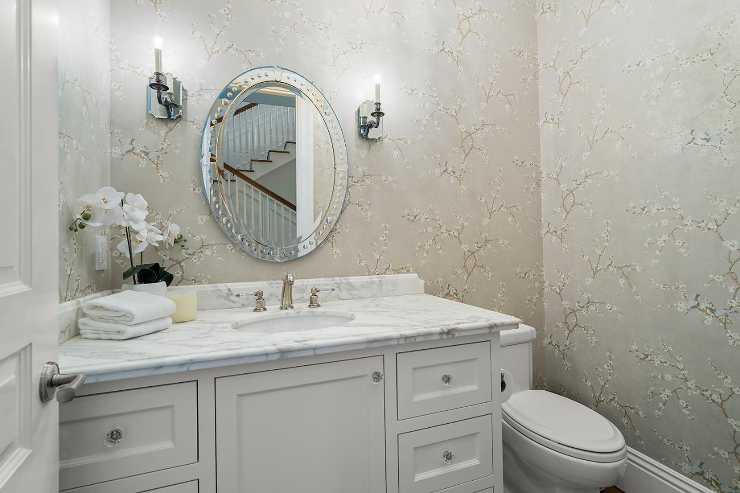 14966 Sobey Road Saratoga, CA 95070 - Photo 21 of 70 a bathroom with a toilet sink and mirror