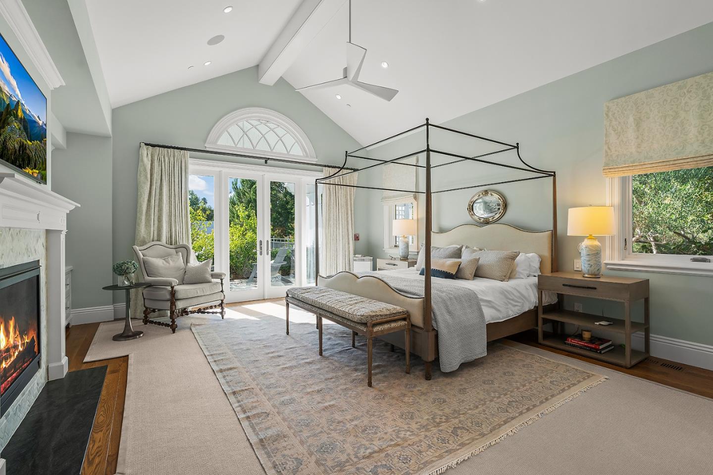 14966 Sobey Road Saratoga, CA 95070 - Photo 22 of 70 a living room with furniture a fireplace and large windows