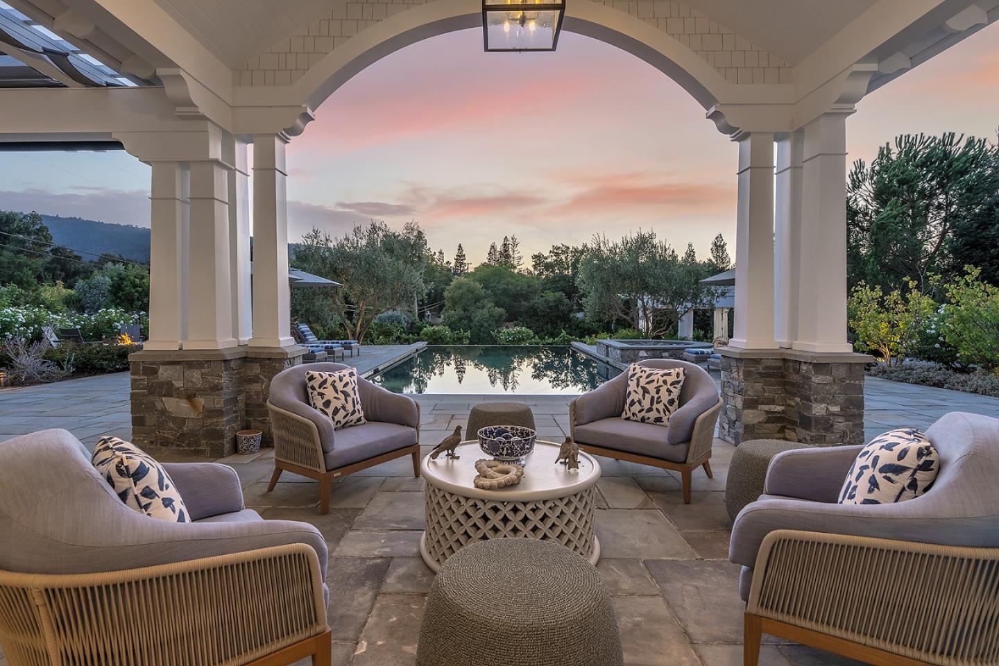 14966 Sobey Road Saratoga, CA 95070 - Photo 45 of 70 a view of a patio with couches chairs and a potted plant