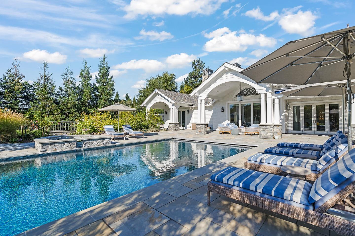 14966 Sobey Road Saratoga, CA 95070 - Photo 59 of 70 a view of a house with pool and lake view