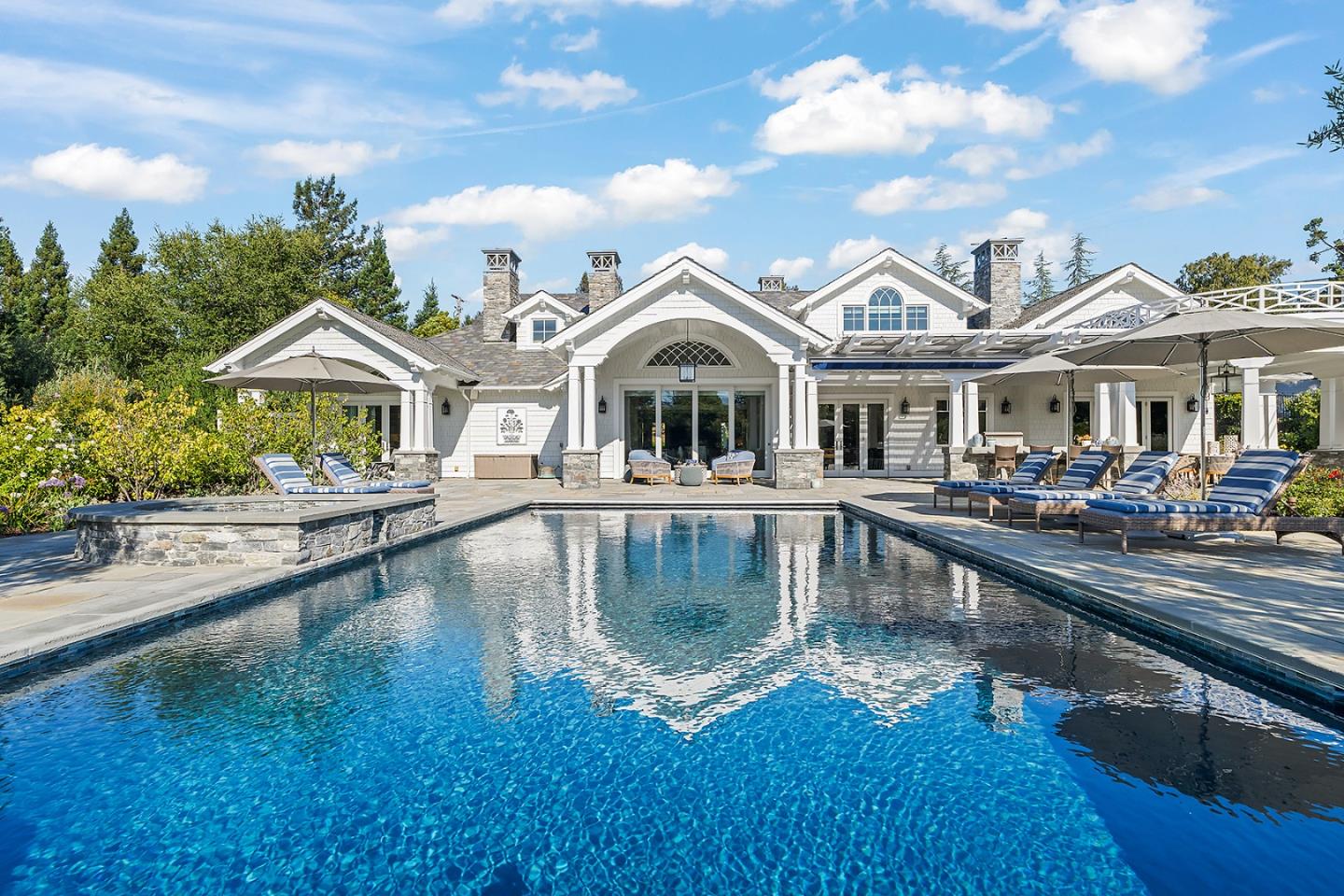 14966 Sobey Road Saratoga, CA 95070 - Photo 60 of 70 a view of a house with pool and chairs