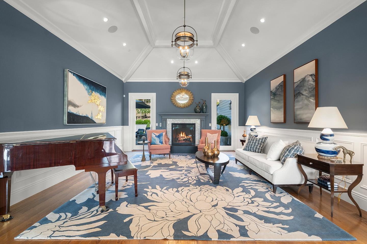 14966 Sobey Road Saratoga, CA 95070 - Photo 6 of 70 a living room with furniture a fireplace and a chandelier