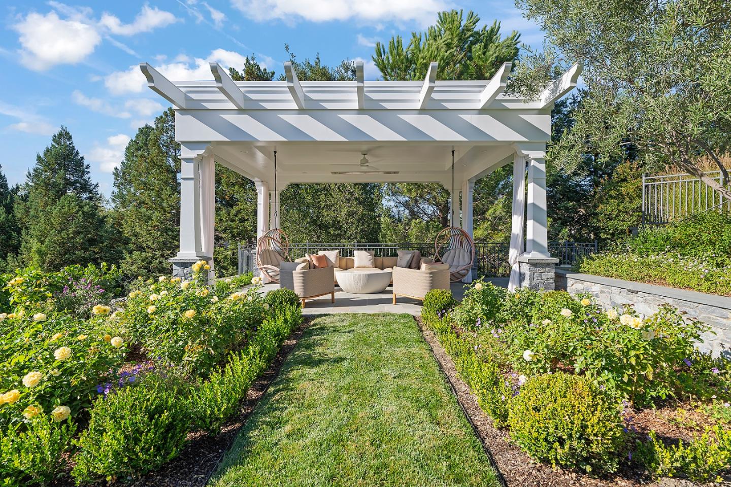 14966 Sobey Road Saratoga, CA 95070 - Photo 65 of 70 a view of a patio with table and chairs potted plants