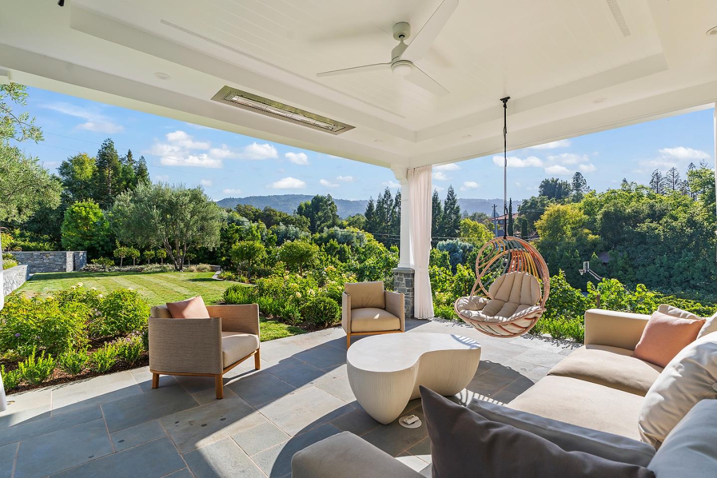 14966 Sobey Road Saratoga, CA 95070 - Photo 66 of 70 a outdoor living space with furniture potted plant and a floor to ceiling window