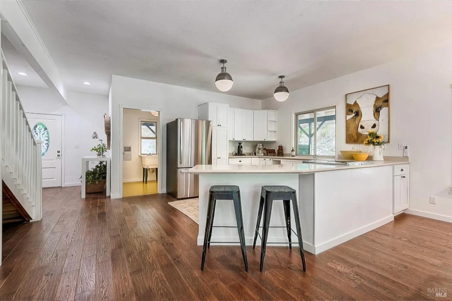 19500 Mountain View Road Boonville, CA 95415 - Photo 11 of 67 a kitchen with wooden floors and appliances