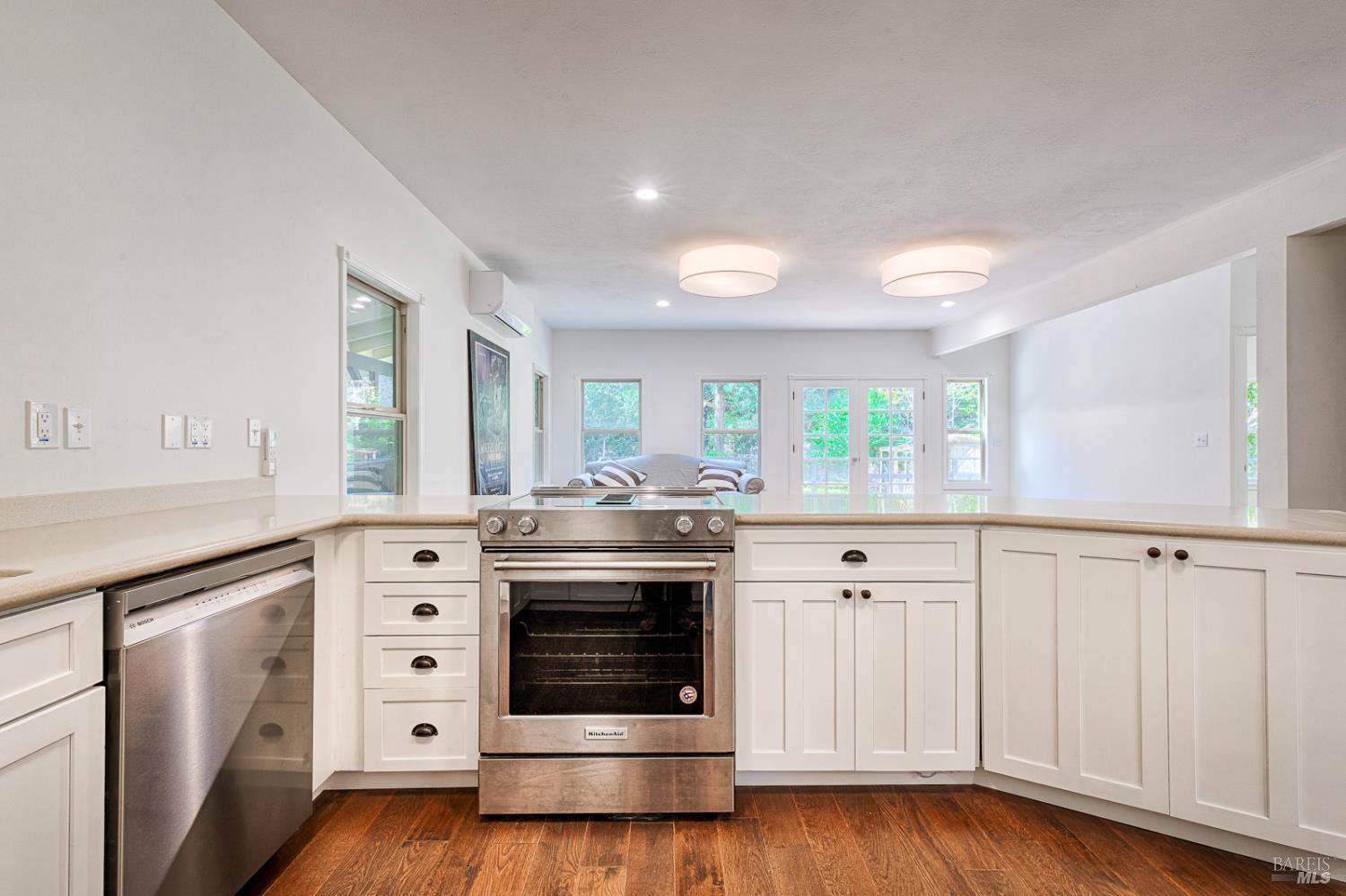 19500 Mountain View Road Boonville, CA 95415 - Photo 13 of 67 a kitchen with stainless steel appliances white cabinets and a window