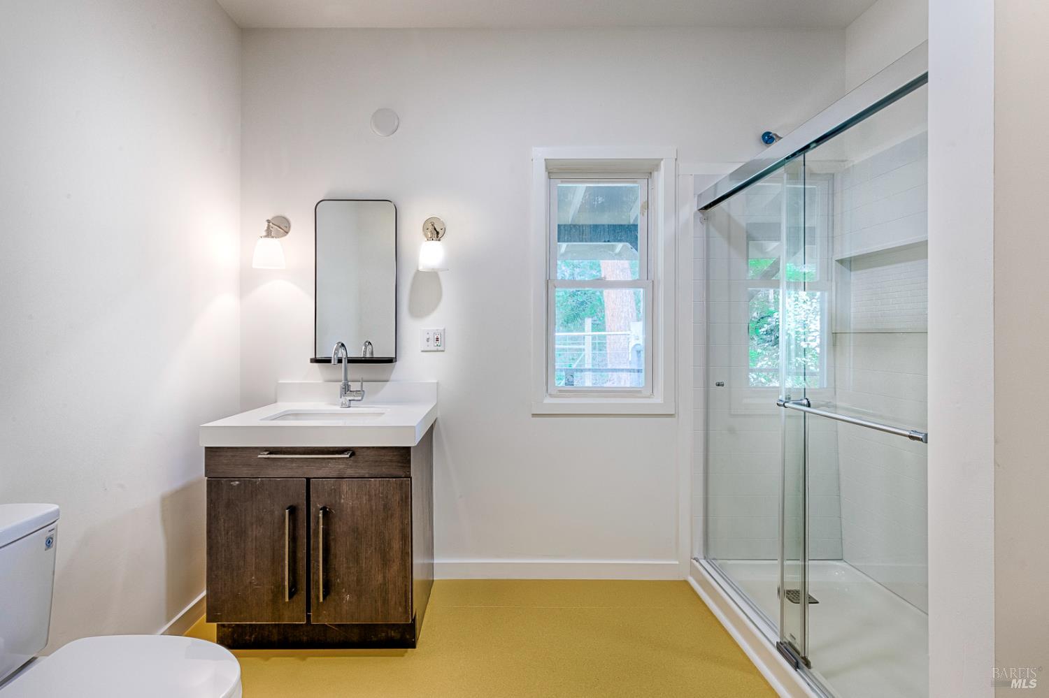 19500 Mountain View Road Boonville, CA 95415 - Photo 20 of 67 a bathroom with a sink a toilet and shower