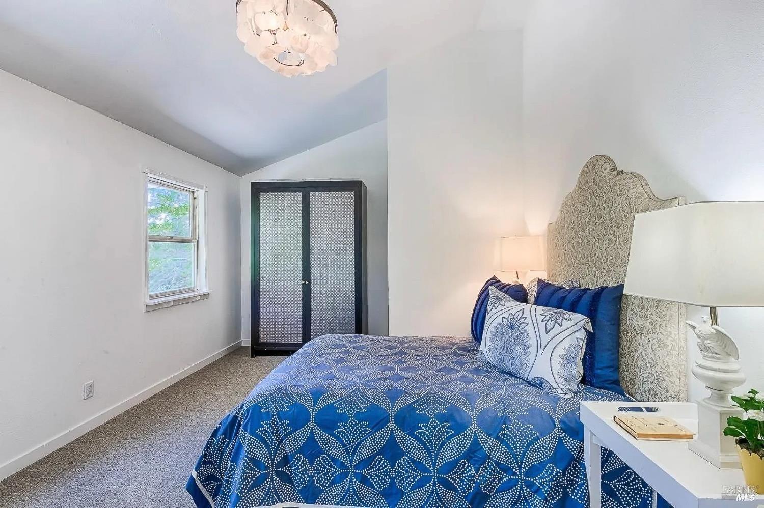 19500 Mountain View Road Boonville, CA 95415 - Photo 26 of 67 a bedroom with a bed and a window