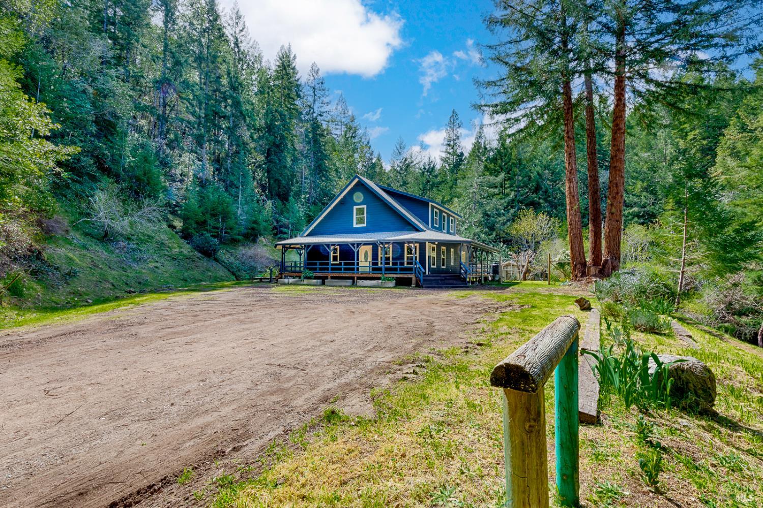 19500 Mountain View Road Boonville, CA 95415 - Photo 43 of 67 a front view of a house with yard and tree s