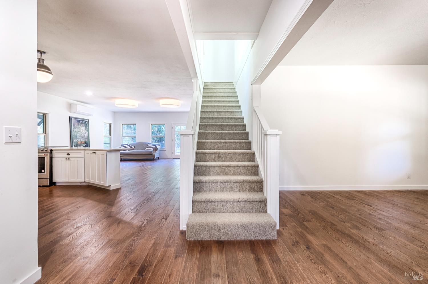 19500 Mountain View Road Boonville, CA 95415 - Photo 9 of 67 a view of a kitchen with wooden floor and stairs