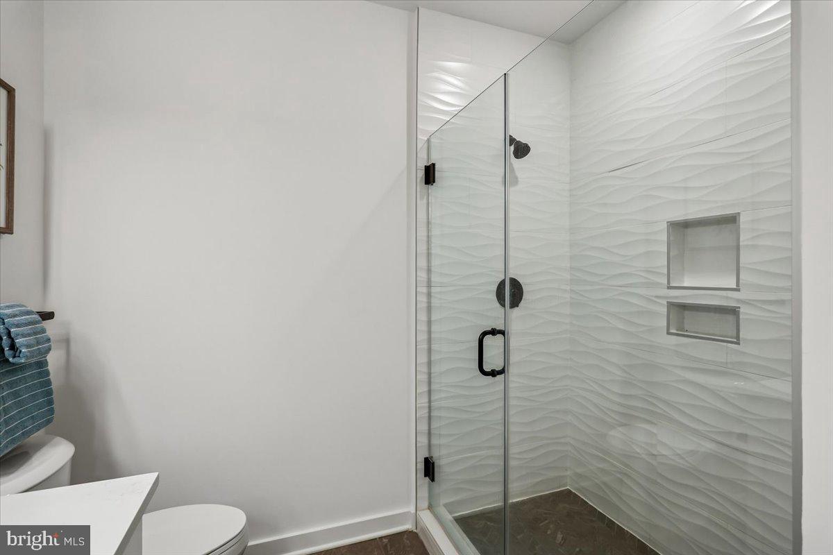 78 Old Mill Bottom Road North, Unit 409 Annapolis, MD 21409 - Photo 22 of 50 Primary Shower with Bench