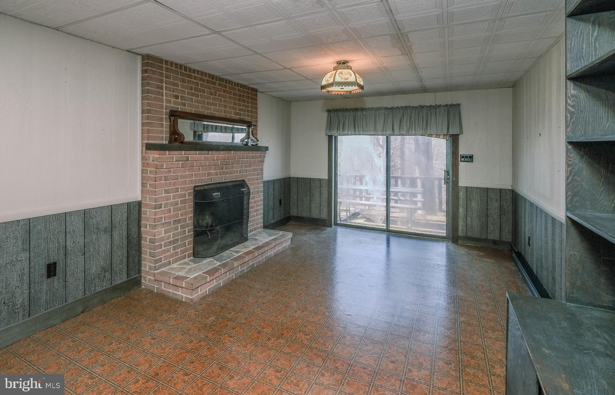 107 Richmond Road Front Royal, VA 22630 - Photo 19 of 75 Timeless brick fireplace in family room