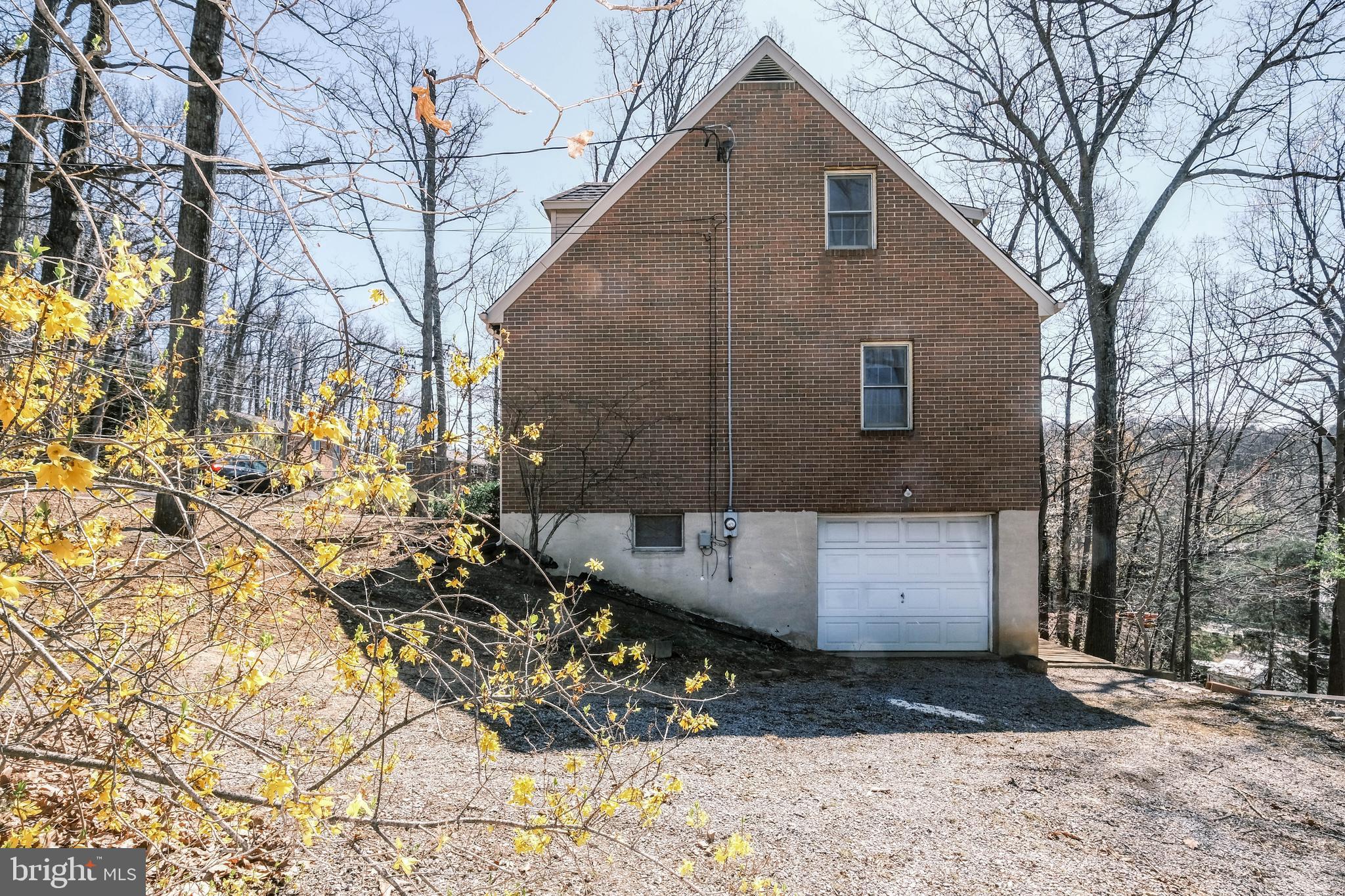 107 Richmond Road Front Royal, VA 22630 - Photo 3 of 72 Garage entrance on right.Basement entrance in rear