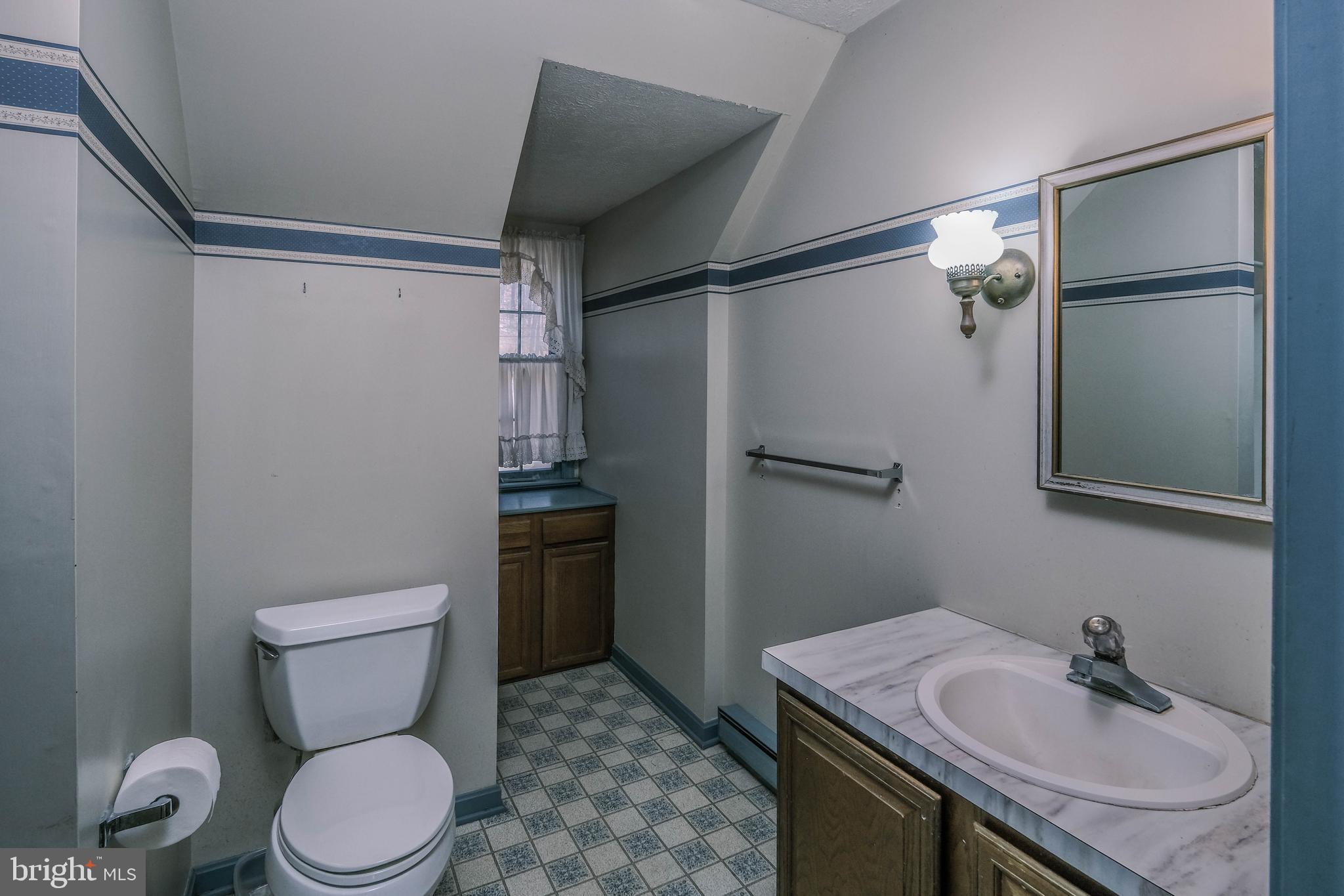 107 Richmond Road Front Royal, VA 22630 - Photo 37 of 72 Primary bathroom also has hall access-newer toilet