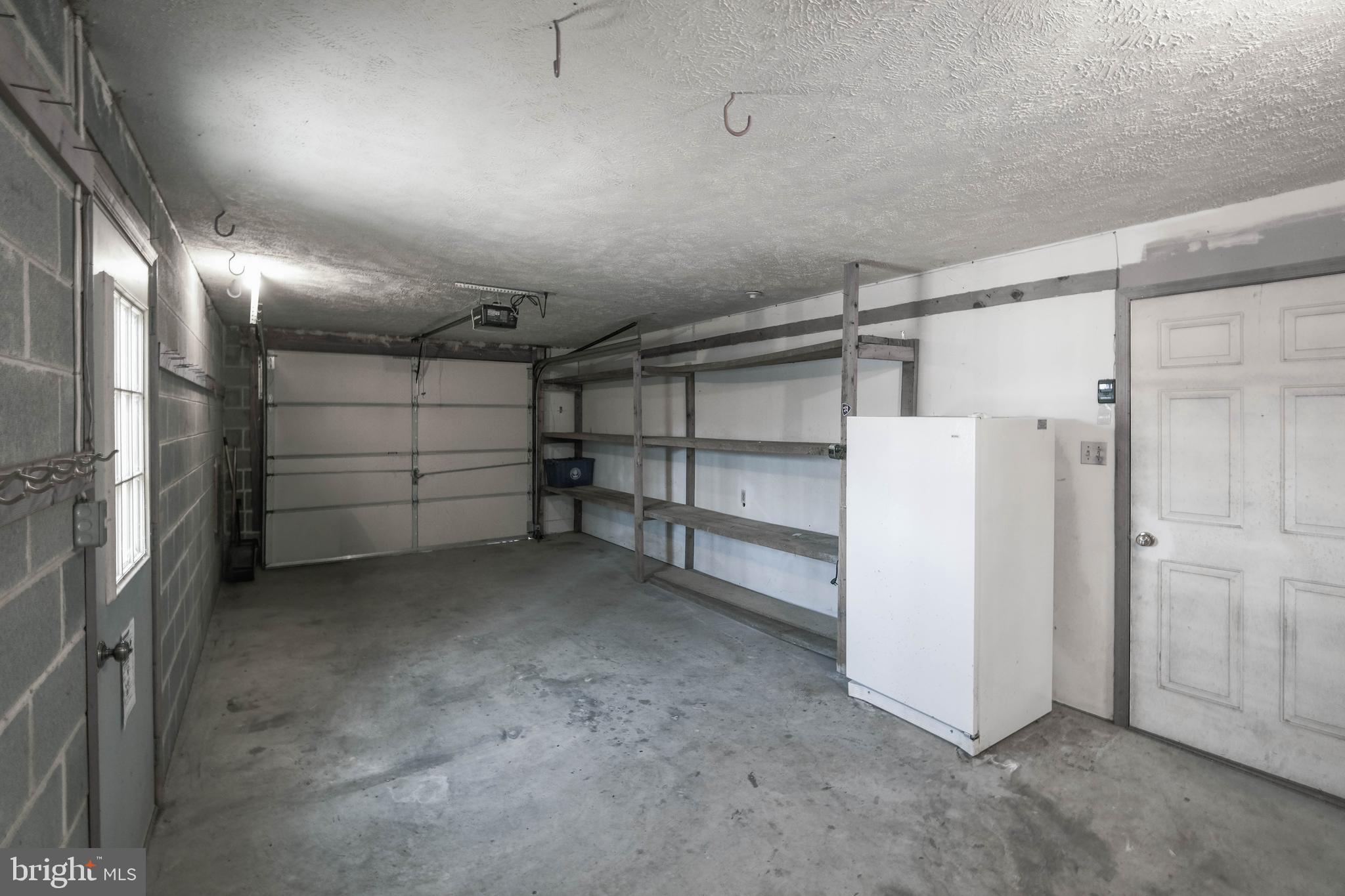 107 Richmond Road Front Royal, VA 22630 - Photo 51 of 75 Deep garage w/ door to recreation room (28x12)