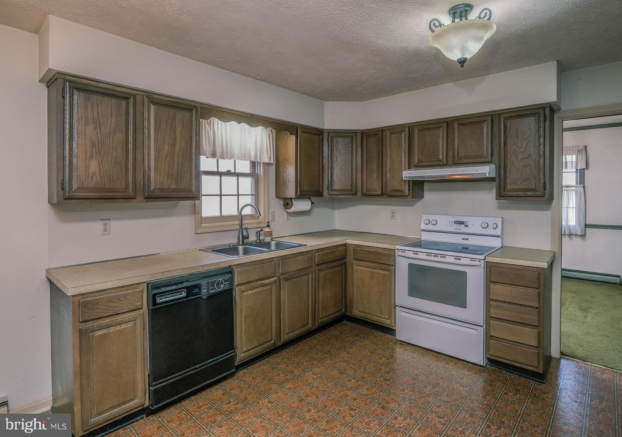 107 Richmond Road Front Royal, VA 22630 - Photo 10 of 75 There's room for a future island in this kitchen