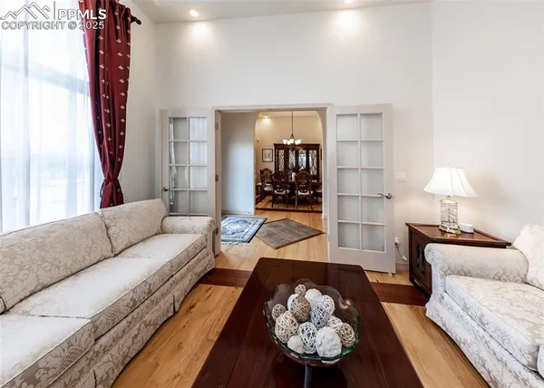 a living room with furniture and a table