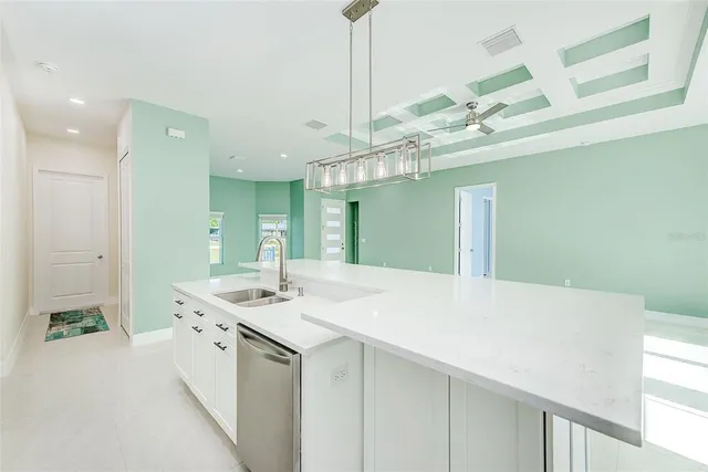 a bathroom with a sink vanity and a mirror