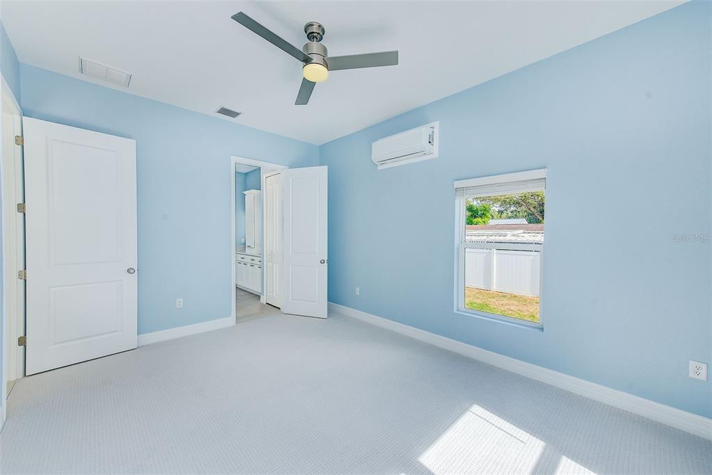 11111 Hackney Drive Riverview, FL 33578 - Photo 17 of 40 an empty room with window and ceiling fan